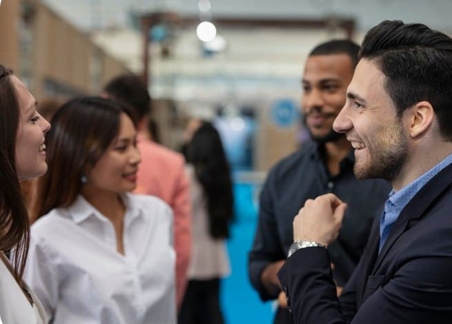 Healthcare professionals talking at a networking event